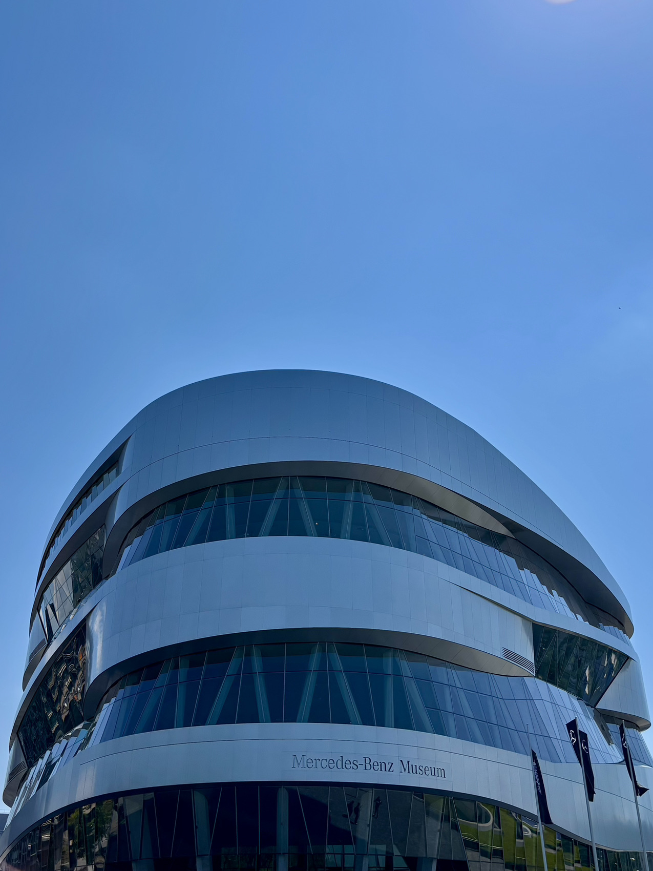 Stuttgart lovers and car enthusiasts, this is where automotive dreams come true! 🤩 The Mercedes-Benz Museum is futuristic, sleek, and honestly just *next level*. Whether you’re a serious petrolhead or just vibing with cool architecture, you’re in for a treat.

Must-See: The Mercedes-Benz Museum  
Address: Mercedesstraße 100, 70372 Stuttgart, Germany  
Opening: Tues–Sun 9am–6pm (last entry at 5pm), closed Mondays  

The Vibe: Bright, sunny atriums (don’t skip that photo op in front of the building’s stunning curves!) set the tone. Inside, the museum spirals up seven floors, tracing automotive history from the very first car up to shiny AMG showstoppers and futuristic concepts. You’ll spot icons like the legendary 300SL “Gullwing”, classic Formula 1 beasts, and even the original Benz Patent-Motorwagen. Fans of design, engines, and pure speed—prepare to geek out 🤓.

Highlights & Tips  
· Take the elevator right to the top and work your way down through history—it’s the most immersive way to experience it.  
· English/German audio guides are free and super helpful.  
· Snap epic photos! The glass, steel, and light inside really make those curves pop on camera.  
· Allow 2–3 hours minimum. Car fans might spend all day here.  
· Café has legit German cakes—reward yourself after time-traveling through car history.

Getting Around: S-Bahn S1 stops at “Neckarpark (Mercedes-Benz)”; it’s an easy walk from there.  

Essentials: Tickets cost €19; buy in advance via trip.com, especially on weekends to skip lines. Lockers are free and handy for daybags.

Don’t miss Stuttgart’s epic auto heritage—even non-car people leave wowed!  
#MercedesBenzMuseum #StuttgartAdventures #CarLovers #ModernArchitecture #tripdotcom