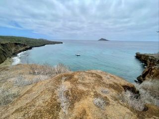 Climbing to Stunning Views on Isla Bartolome