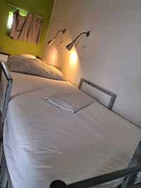 “Budget Sleep with Bold Flaws: Money‑Saver Close to MRT”