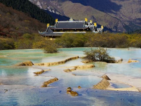Huanglong Scenic Area: Turquoise Terraces Amidst the Mountains of