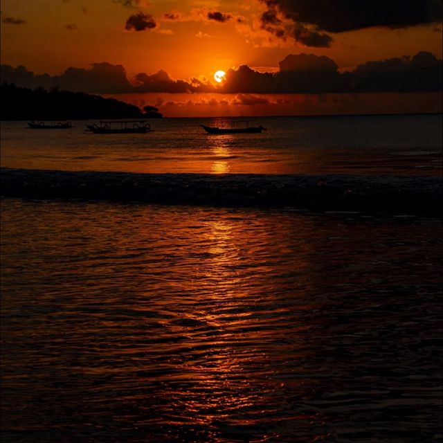 Beautiful sunsets at the jimbaran beach in bali 