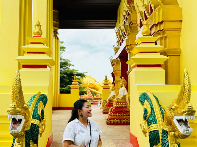 Be calm and enjoy the glow of the golden reclining Buddha in Laos! 
