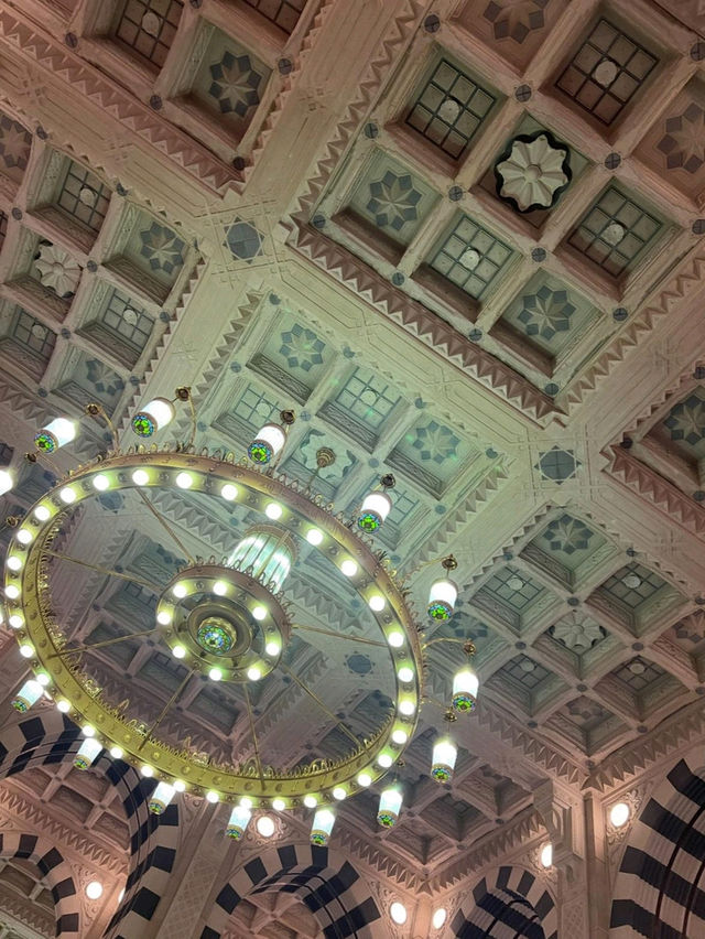 Praying at the sacred Al-Masjid Al-Nabawi in Medina, a truly spiritual experience