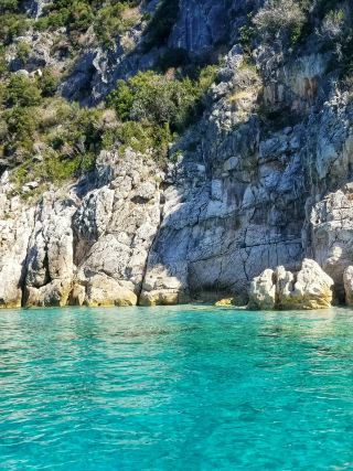 Dhermi Beach: Where Azure Waters Meet Albanian Mountain Backdrop