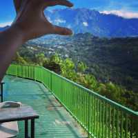 Misty town with Mount Kinabalu view