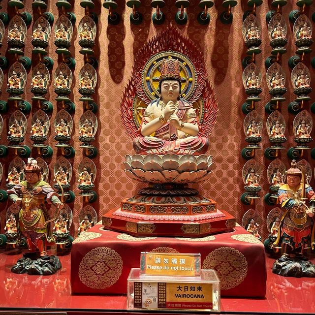Praying at Buddha Tooth Relic Temple