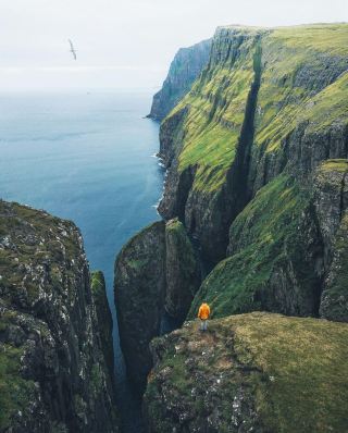 Unveiling the Hidden Gems: The Majestic Cliffs of Faroe Islands 🌊