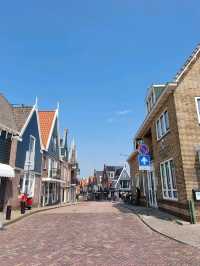 Volendam Vibes: Boats, Breezes, and Bright Houses