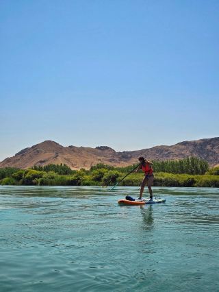 🏄‍♀️ One of the Best Summer Activities in Almaty: Paddleboarding on the Ili River
