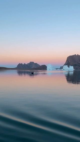 Unforgettable Moments in Greenland: Cruising Amongst Mountains and Colorful Skies