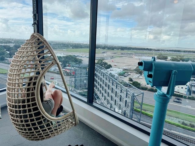 Airport View + Swing Chairs = Bliss.