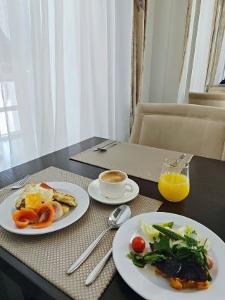 Pancakes, cottage cheese, fish: a Russian-style breakfast at the Zvezda Hotel