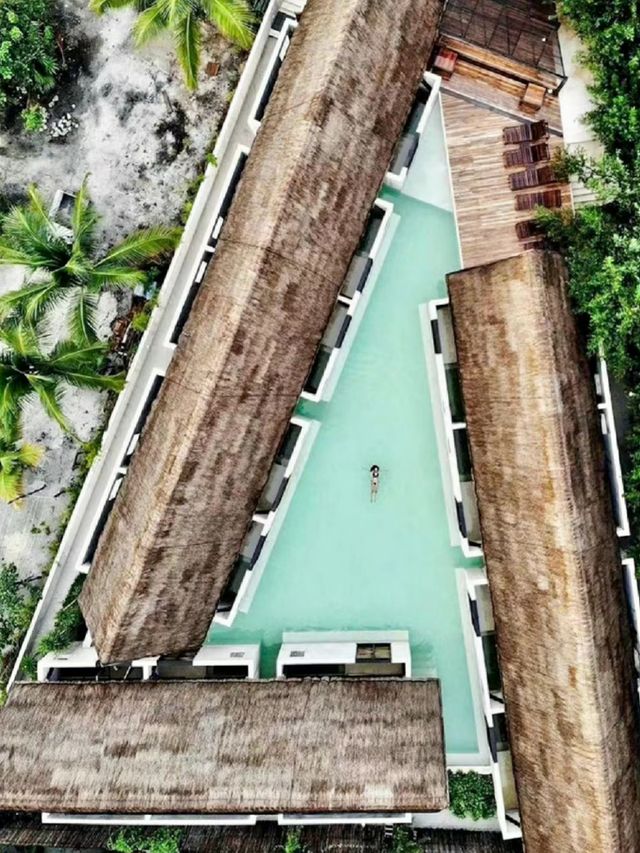 "A tranquil hotel floating on the water, where each room is an island."