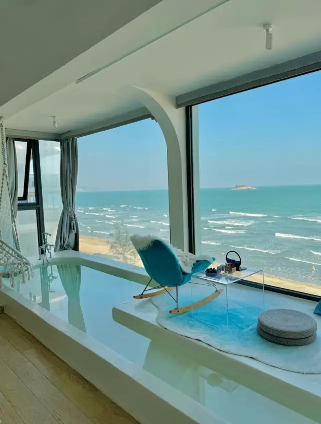 Finally found a room with a huge floor-to-ceiling window overlooking the sea