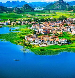 Forget Dali, head to Mile with its 24°C summer weather—fewer crowds and stunning scenery!