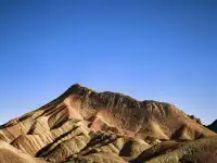 不望祁連山頂雪，錯把張掖當江南