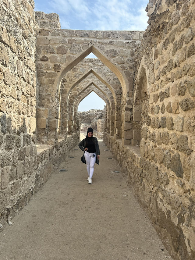 “Whispers of the Past: The Timeless Walls of Bahrain Fort”