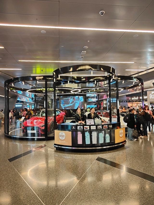 Between Benz and Bear: A Surreal Stroll Through Hamad Airport