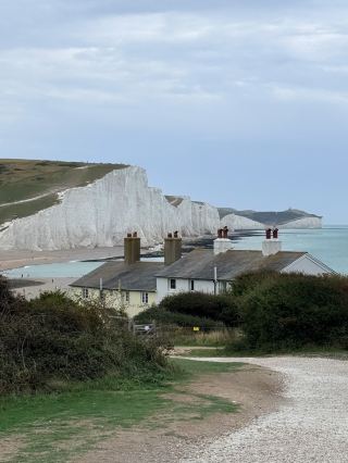 Seven Sisters Cliffs near London is a photogenic legend—if you’re craving dramatic coast, iconic white cliffs, and that perfect windswept selfie, this spot fully delivers! 🌊📸 Seaford makes an ideal base for visiting, and with clear weather, your shots basically edit themselves. This place is a top pick for London day trips, but doesn’t feel touristy at all.

Must-See: Seven Sisters Cliffs  
Address: Exceat, Seaford BN25 4AD, United Kingdom  
Open: Year-round, all day (so sunrise and sunset pics? Yes, please!)  
Tip: Start at the Seaford end for the most epic photos—the walk from Seaford to Eastbourne gives you non-stop Insta-worthy angles of those famous cliffs. Bring good walking shoes because some paths are steep, and check the tide schedule if you plan to hike the beach level.

Getting There:  
Take the train from London Victoria to Seaford (about 1 hour 30 mins, transfer at Lewes). The Seven Sisters bus (12, 12X, or 13X) from Seaford station gets you right to Exceat, or you can walk from Seaford beachfront to the cliffs. Super simple and scenic!

Food Recs:  
Pack snacks or a picnic. There aren’t many cafés directly on the cliffs—bring water and take your time chilling on the grass. The Seaford town center has cute bakeries and fish & chips spots for your post-hike treat.

Weather:  
Check the forecast before you go! A clear day means insane colors in your photos, but bring a windbreaker—it gets breezy up top.

#SevenSisters  #SeafordAdventures  #UKCoastline  #LondonDayTrip  #TripDotCom 