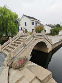 朱家門巷陌，一橋煙雨話狀元