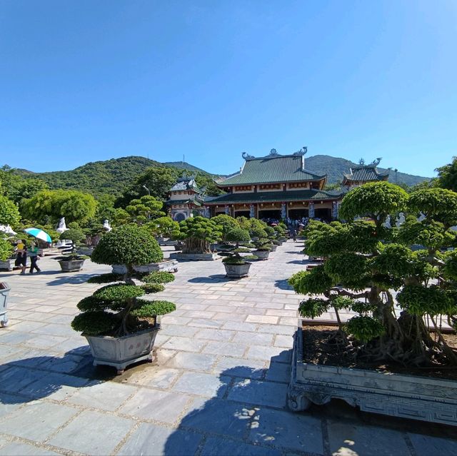 Peace and tranquility beside a giant Buddha.