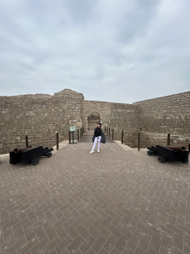 “Whispers of the Past: The Timeless Walls of Bahrain Fort”