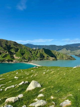 Calm Bay with Clear Water and Gentle Coastal Views