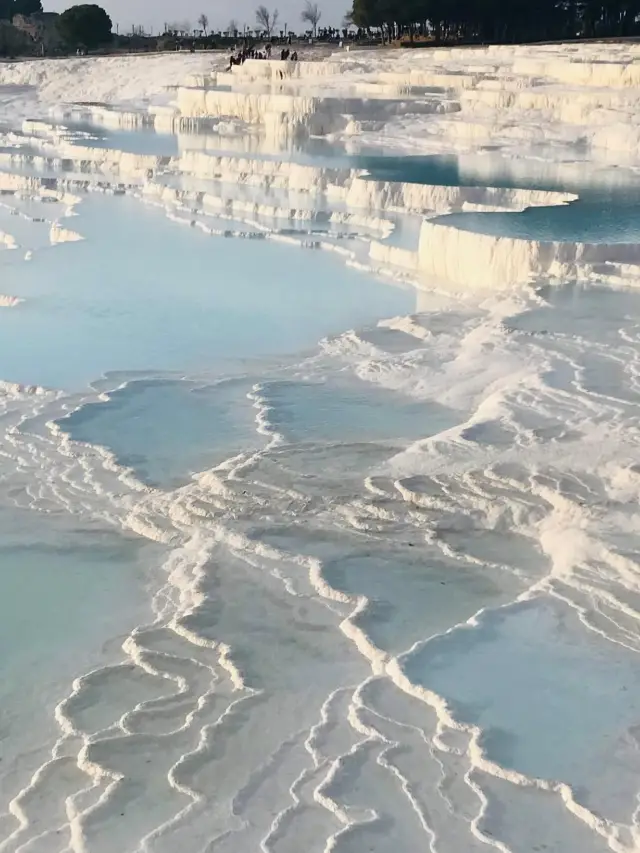 Denizli's Pamukkale: A White Wonderland of Hot Springs, Travertines, and Ancient Roman Ruins!