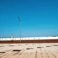 A Scenic Promenade with Ocean Views and Public Art