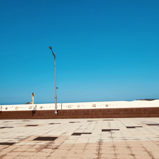 A Scenic Promenade with Ocean Views and Public Art