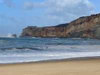 🌊 Nazaré Beach, Portugal: Where Giants Rise from the Sea 🏄‍♂️🇵🇹