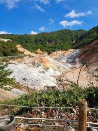 “Journey Through Steam: The Hiking Path to Hell Valley’s Onsen”