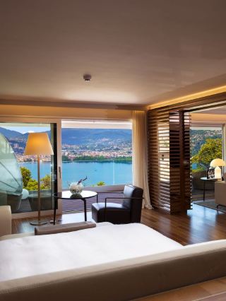🌟 Lugano's Luxe Lodgings: Serenity & Scenery! 🏔️✨