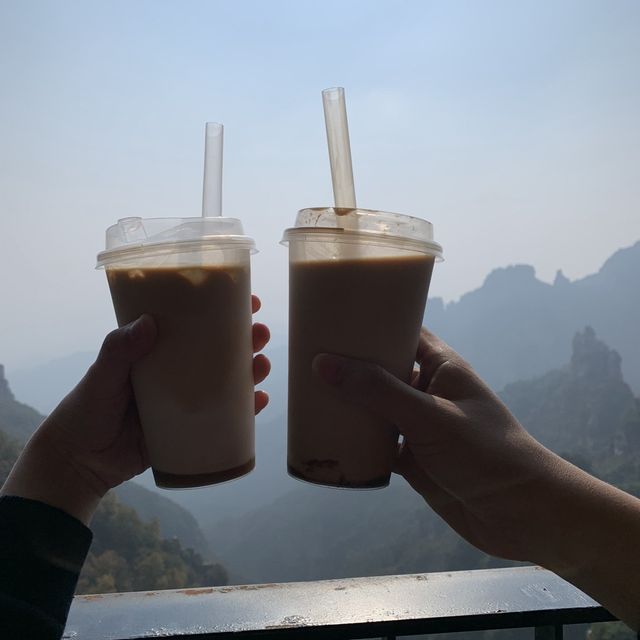 Drinking iced latte on top of Baishi Mountain