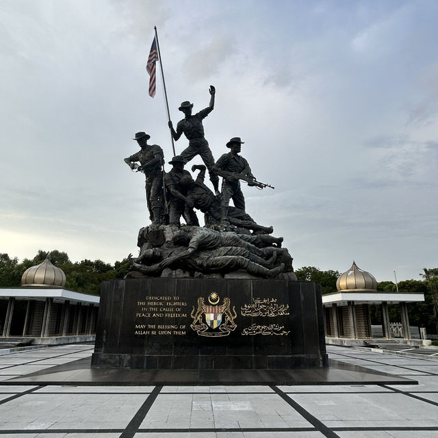 Tugu Negara: A Solemn Solo Journey Through Malaysia's Fight for Freedom"** 🌿🕊️
