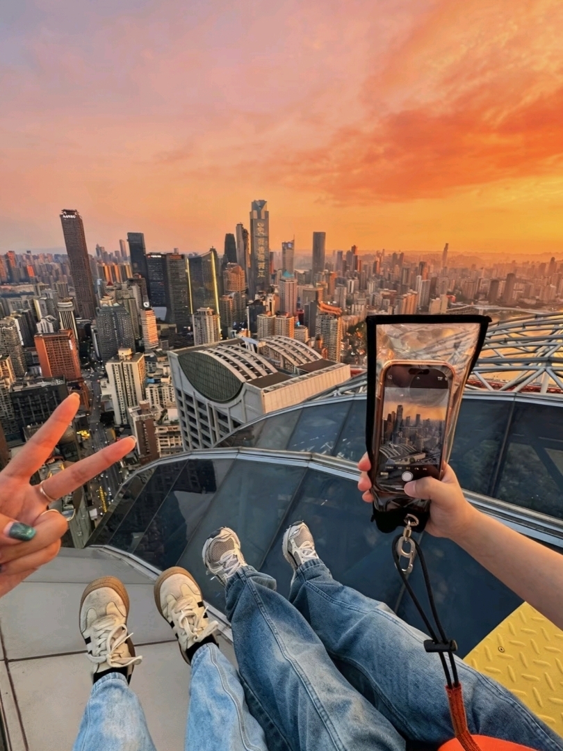 Feel like you're floating in the air, walking on clouds, watching the sunset over the mountain city, and experiencing the most advanced MR rides! 🌇

🌤️ 📍 Starting at Raffles City · Chaotianmen
Best time to visit: 5:30 PM (Catch both the sunset and night view!)
Look down to see the intersection of two rivers, a view that only "Chongqing can offer" — a city of heights, layers, and floating landscapes. ✨
☁️ Next stop: Exploration Pod · Cloud Park

1) Cloud Walk
A 380-meter-long skywalk that loops around, offering a 360° view of the entire city. It's incredibly romantic, but be prepared for shaky legs as you walk.

2) Cloud Soar
A sky swing during sunset = unbeatable views 🌤️
The entire city serves as a golden-pink backdrop.

3) Sky Mirror
A transparent glass floor that lets you see buildings, cars, and rivers below. It's stunning but nerve-wracking for those afraid of heights. Stay calm, though—the photos are worth it.

4) Sky Traveler
The ultimate highlight! The Mechanical Arm MR ride.
It feels like you're on a roller coaster that truly floats, giving you a sense of weightlessness as if you're soaring through the sky.
If you're visiting CQ, this is a must-try! 🎢⚡

🎞️ Classic Animation Review Exhibition
📍 Hosted by Shanghai Animation Film Studio
Chinese name: 上海美术电影制片厂经典动画回顾展
This trip will take you into the world of classic Chinese cartoons from the 80s–90s, featuring:
Nezha • Calabash Brothers • Black Cat Detective
There are zones for Chinese ink art, paper cutting, puppetry, and hand-drawn animation. It's heartwarming and nostalgic, especially for those who grew up in China during the 80s–90s.

🚇 How to get to Cloud Park
📍 Pin the location as:
来福士探索舱 / 云端漫步 / 云端公园
or Raffles City Chongqing 来福士重庆