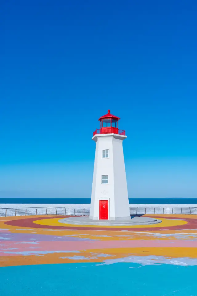 The lighthouse and sea ice in Dalian in winter