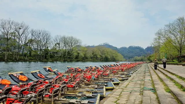 Watching the winding Nine-Bend Creek from a bamboo raft in Wuyi Mountain