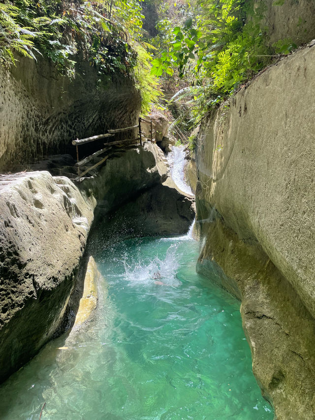 Take a chill break in cold waters and test your courage at Dao & Binalayan waterfalls 