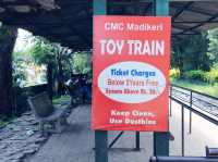 Toy train with Indian friends in Coorg, India