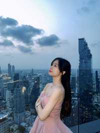 Pink dress with Mahanakhon sunset