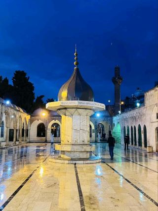 #winterescape Step Into Sacred Legends at Mevlid-i Halil Mağarası 🌙✨  
Nestled in the spiritual heart of Şanlıurfa, Mevlid-i Halil Mağarası is believed to be the birthplace of the Prophet Abraham—making this mystical cave a must-visit for travelers seeking deep-rooted history and serene energy! The atmosphere here hums with centuries-old legends, complemented by striking Western-style stonework and the glowing ambiance of nightfall outdoors.

Start your visit walking through the tranquil courtyards of Mevlidi Halil Cami (Göl, 63200 Şanlıurfa Merkez/Şanlıurfa), open 24/7 so you can experience both the quietude of early morning or the magical illumination at night. Take your time soaking in the gentle blend of traditional and Western architecture before heading to the cave itself. Must-do: Step inside the cave with a moment of reflection—many visitors use this pause to appreciate the spiritual resonance and age-old stories that breathe through the cavern walls.

For photography lovers, the outdoor area after sunset is pure gold. Capture the glowing mosque façade framed against the starry Şanlıurfa sky or find unique angles where natural rock and crafted stonework create an insta-worthy silhouette.

Wear respectful attire, as the site holds religious significance. It’s busiest on Fridays and during prayer times; visit on a weekday evening for a quieter, contemplative experience. Keep in mind the marble courtyards can get slippery after rain, so comfortable shoes are a plus.

Whether you’re a history buff or a seeker of moving cultural moments, this spot offers a blend of story and serenity that lingers long after you leave.

#Sanliurfa #MevlidiHalil #SacredSites #TravelTurkey #NightPhotography
