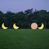 🌙 Fuxing Park: Moon Phases Art in the French Concession
