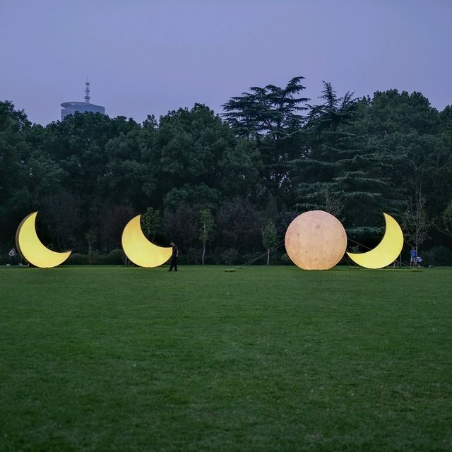 🌙 Fuxing Park: Moon Phases Art in the French Concession
