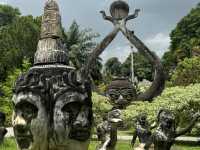 A collection of intricate and awe-inspiring Buddhist and Hindu statues