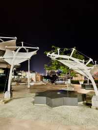 Flags, Lights & Midnight Calm – Putra Square at Night