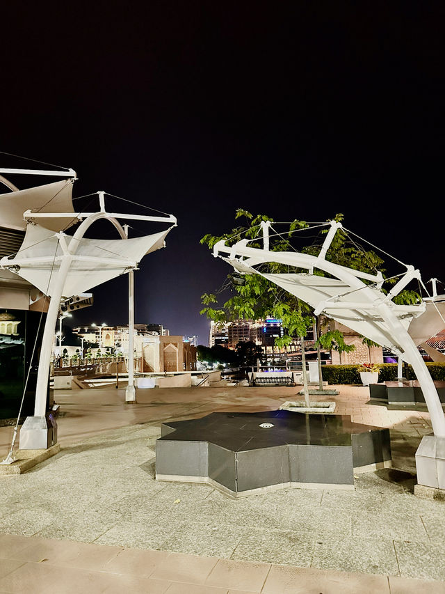 Flags, Lights & Midnight Calm – Putra Square at Night