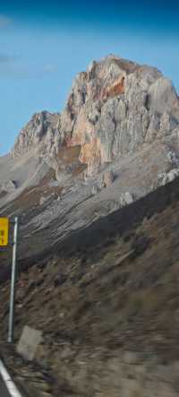 不去這山就去納山
