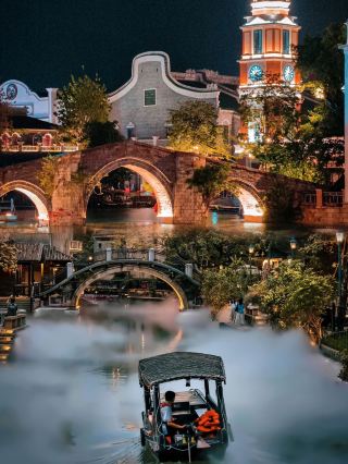 江南の水郷とヨーロッパ風の時計台が出会うとき、誰がこのロマンチックな衝撃を理解できるでしょうか？