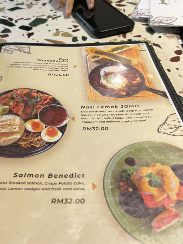 🍽 "Hidden Gem Near the Runway: JOMO Eatery Shines!" 🍰